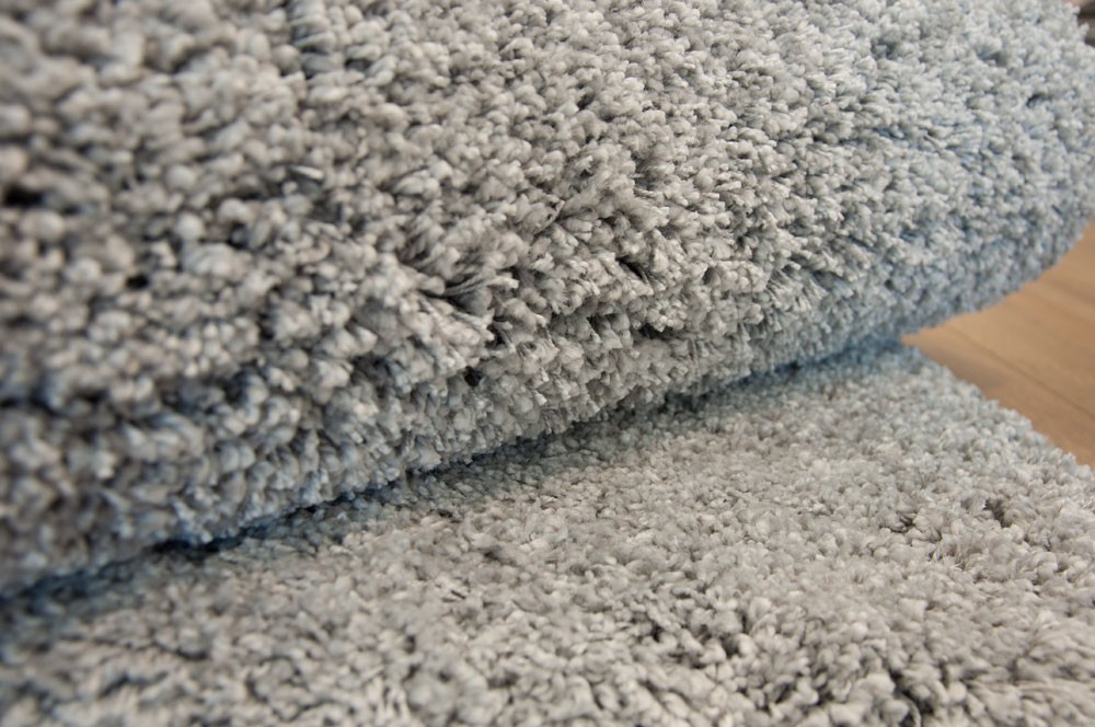 Klokje winkel straf polypropyleen synthetisch grijs machinaal geweven effen tapijt 1
